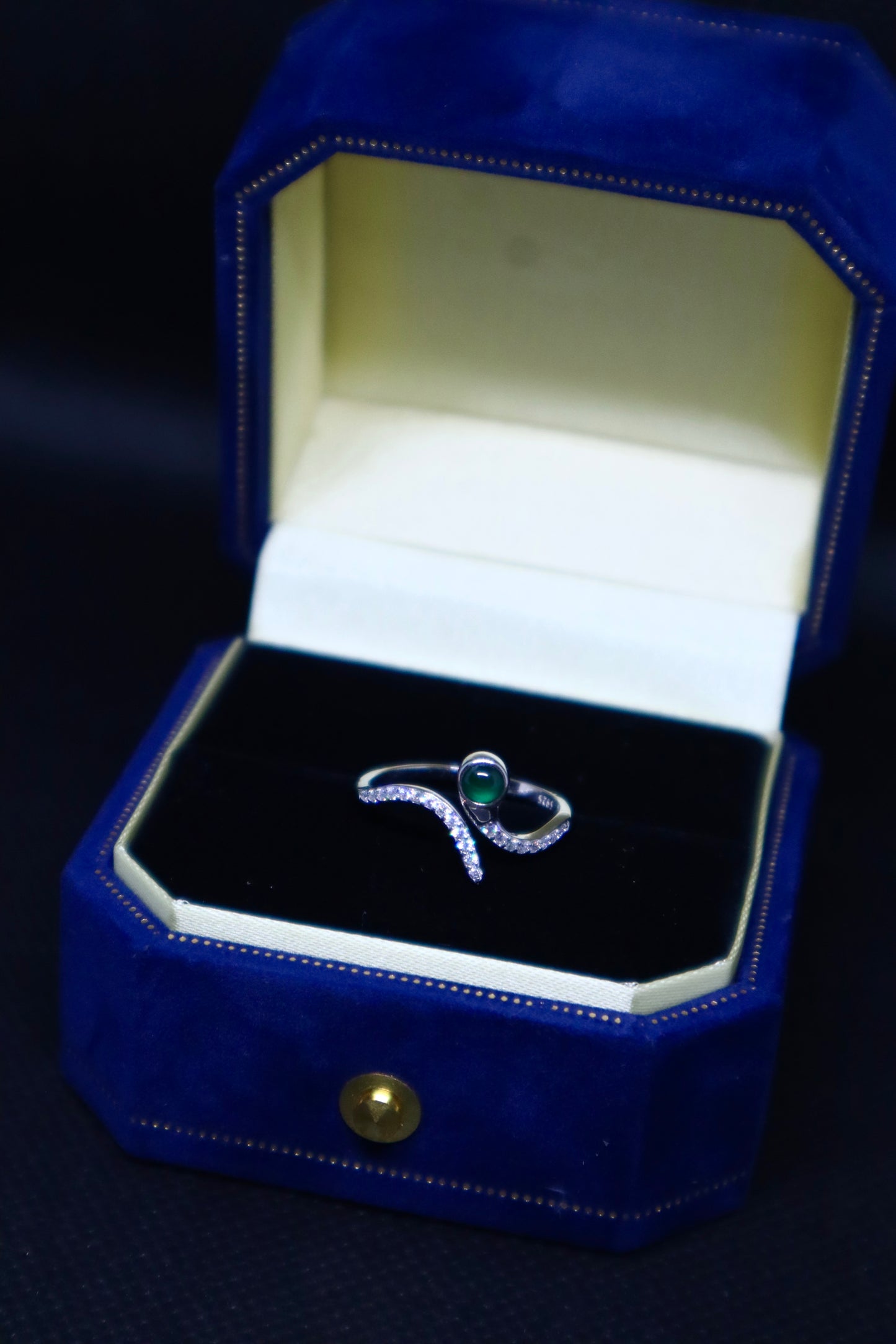 Elegant Snake-Inspired Jade Ring with Sterling Silver and Cubic Zirconia Accents