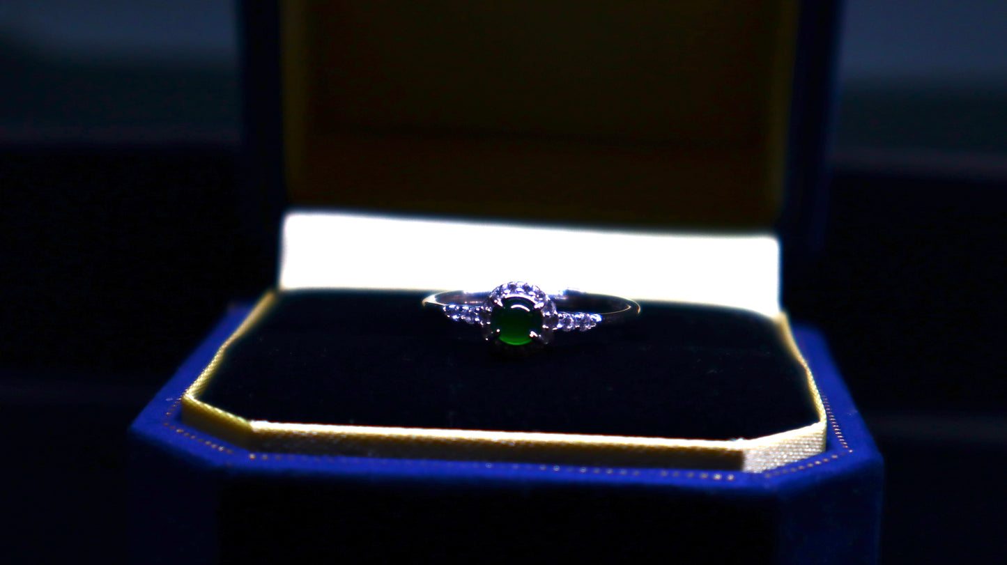 Classic Round Jade Ring with Halo of Sparkling Cubic Zirconia in Sterling Silver