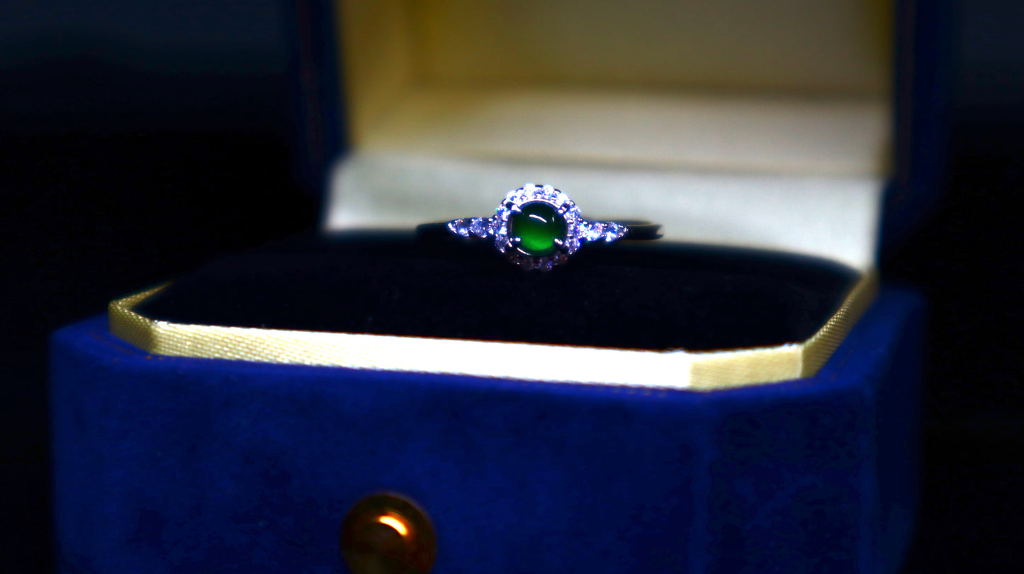Classic Round Jade Ring with Halo of Sparkling Cubic Zirconia in Sterling Silver