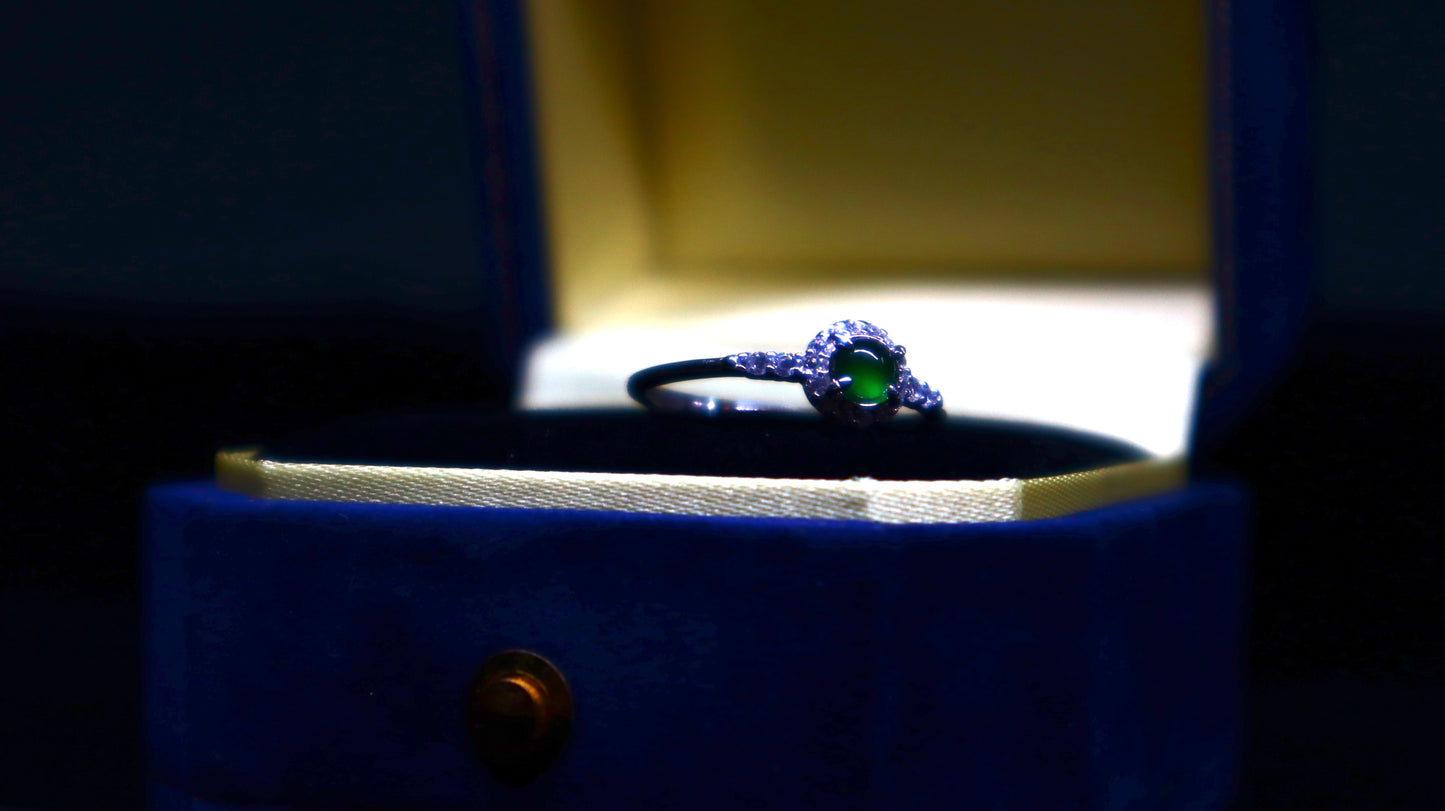 Classic Round Jade Ring with Halo of Sparkling Cubic Zirconia in Sterling Silver