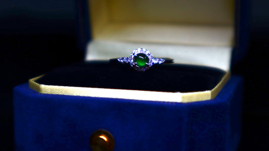 Classic Round Jade Ring with Halo of Sparkling Cubic Zirconia in Sterling Silver