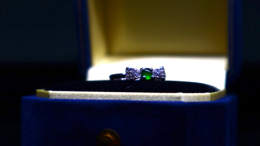 Elegant Bow-Inspired Jade Ring with Sterling Silver and Cubic Zirconia Accents